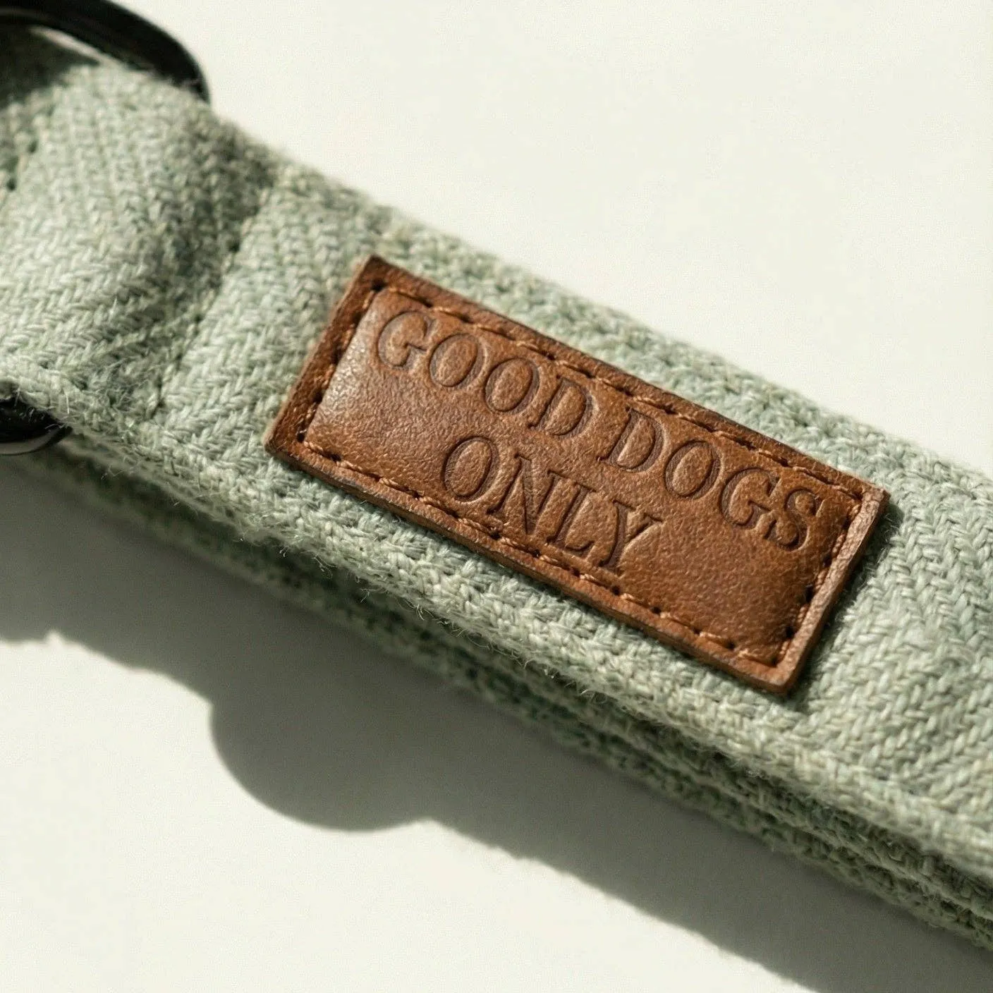 Close-up of the tweed and leather tab
